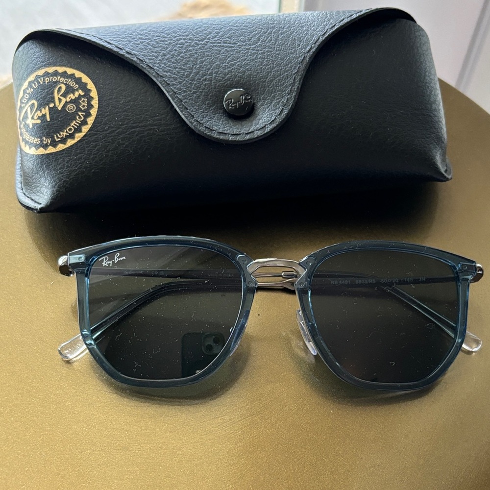 🔥Price Drop🔥Ray-Ban Men’s Blue Transparent Frame Sunglasses with Black Lenses